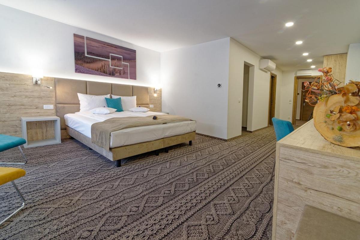 Aquarius Boutique Hotel Кимпулунг-Молдовенеск Номер фото